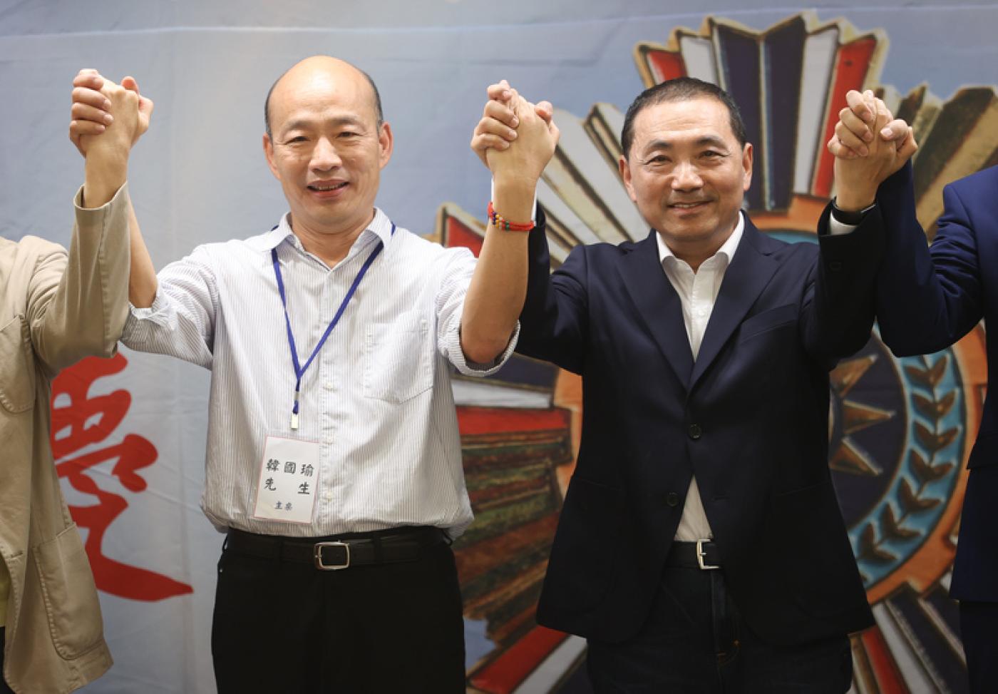 侯友宜、韓國瑜兩人7月1日在國民黨黃復興黨部成立周年會慶上首次同框。中央社