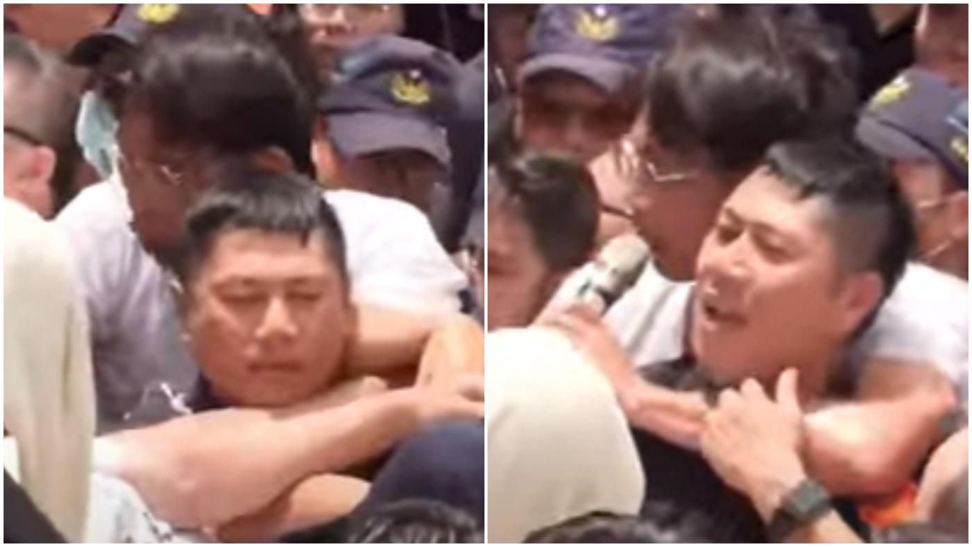 黃國昌在走讀衝突中，一度勤警員脖子，警員表情痛苦不適。翻攝柯文哲YT